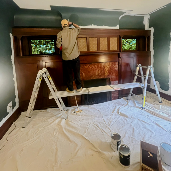 Phil C-B painting a room in his house